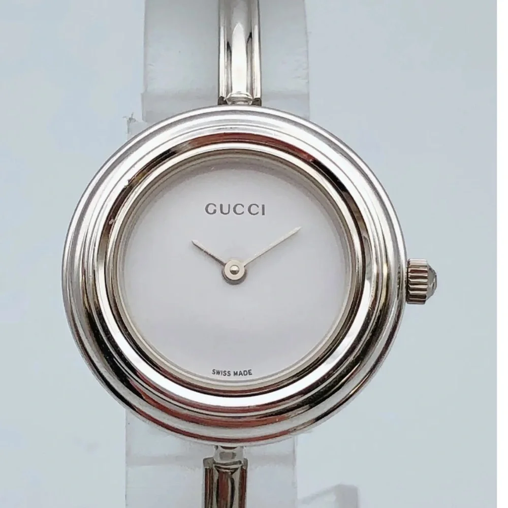 Gucci Silver Bracelet Watch with all bezels shown